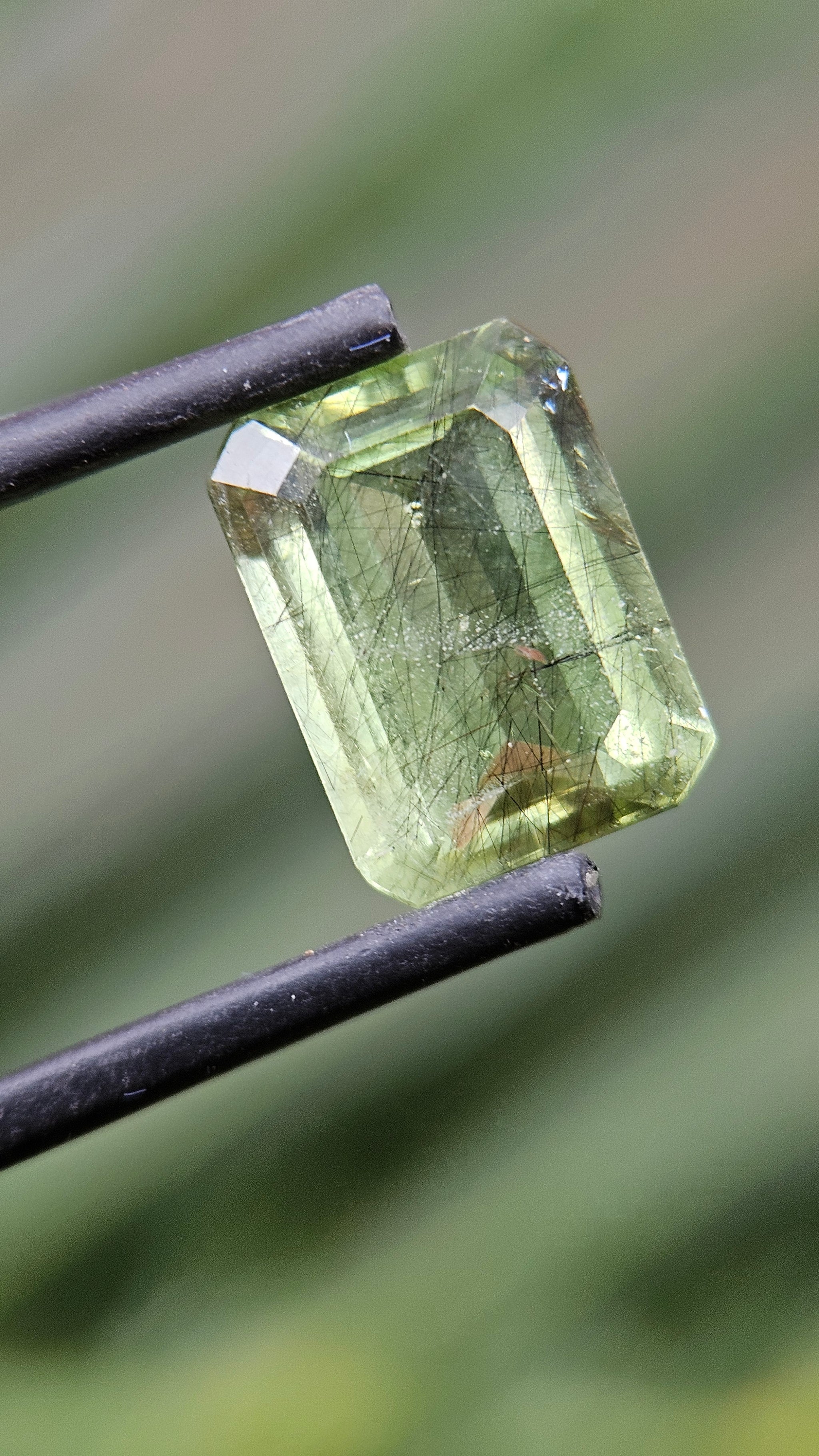 Rare 4.71ct Actinolite needles present in Peridot!