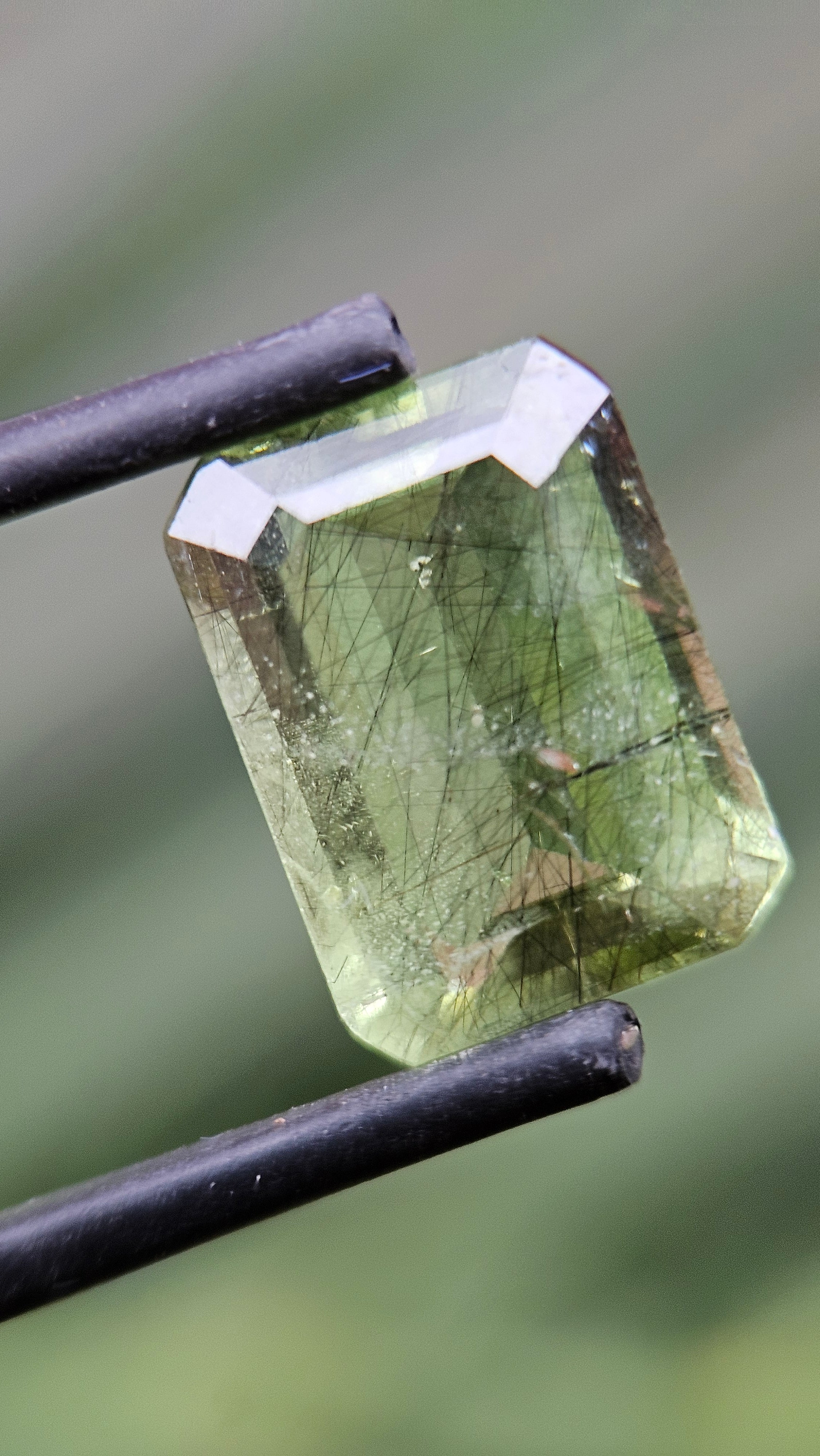 Rare 4.71ct Actinolite needles present in Peridot!