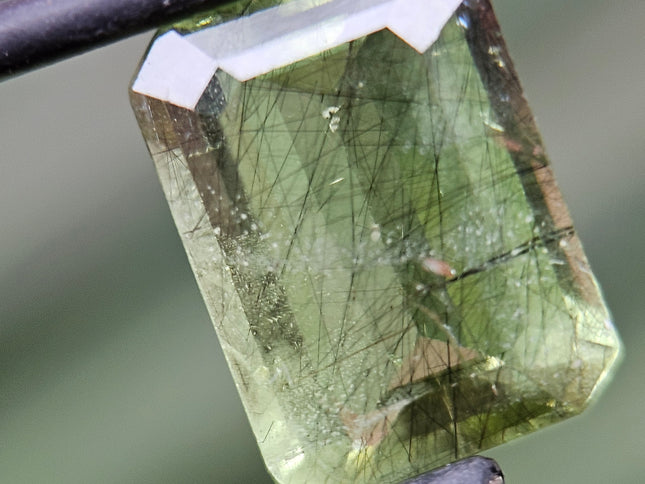 Rare 4.71ct Actinolite needles present in Peridot!