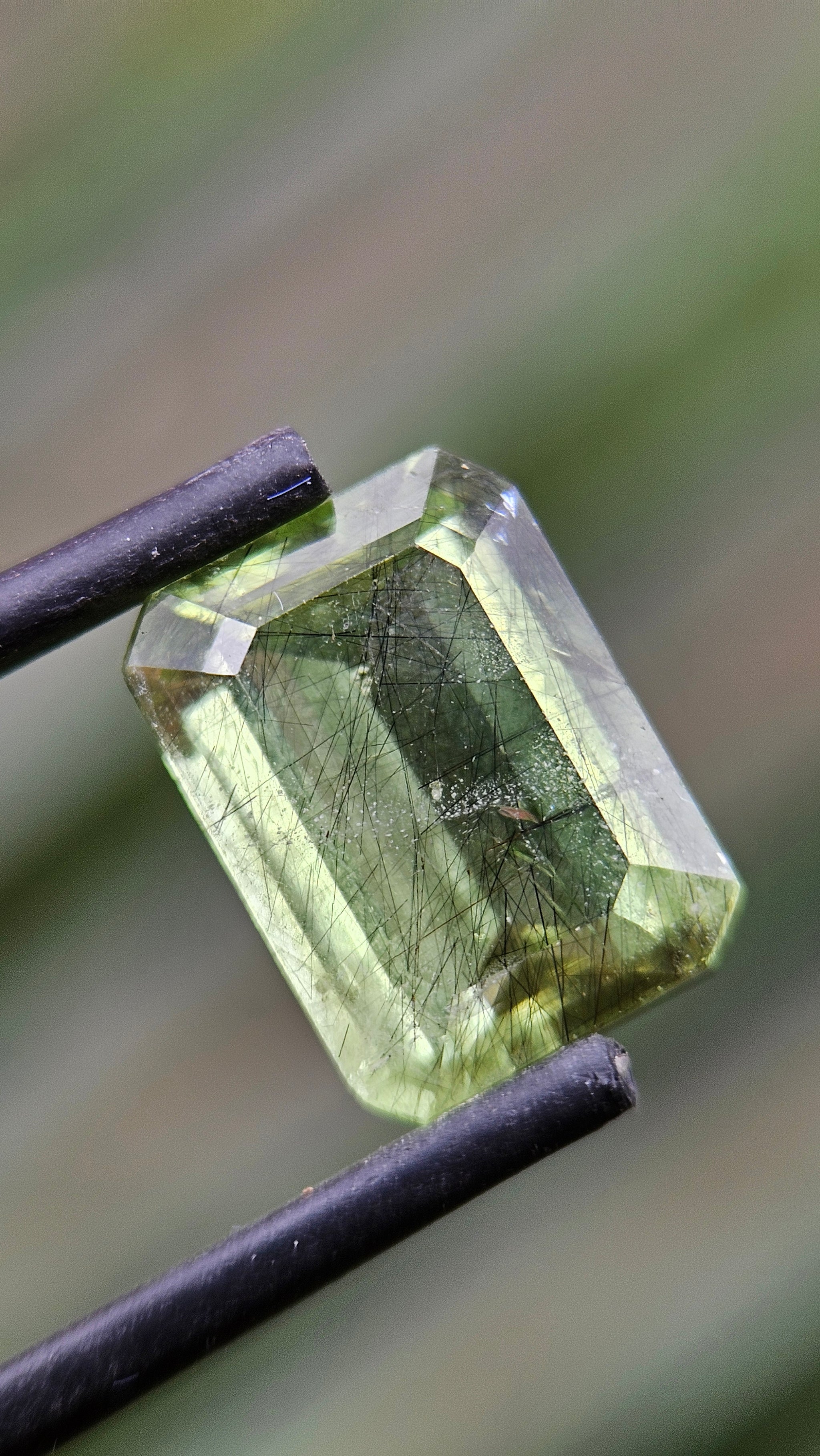 Rare 4.71ct Actinolite needles present in Peridot!