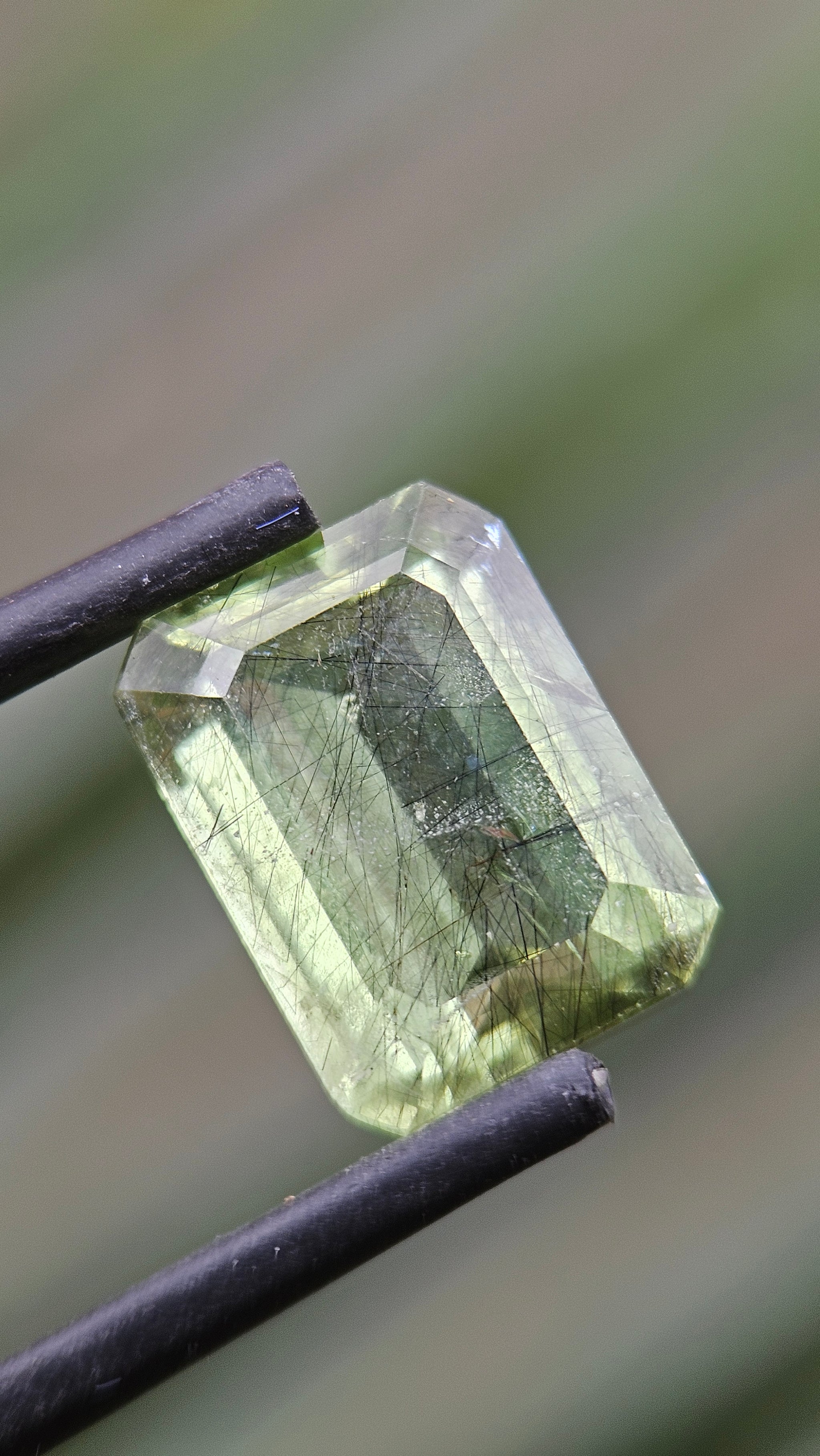 Rare 4.71ct Actinolite needles present in Peridot!