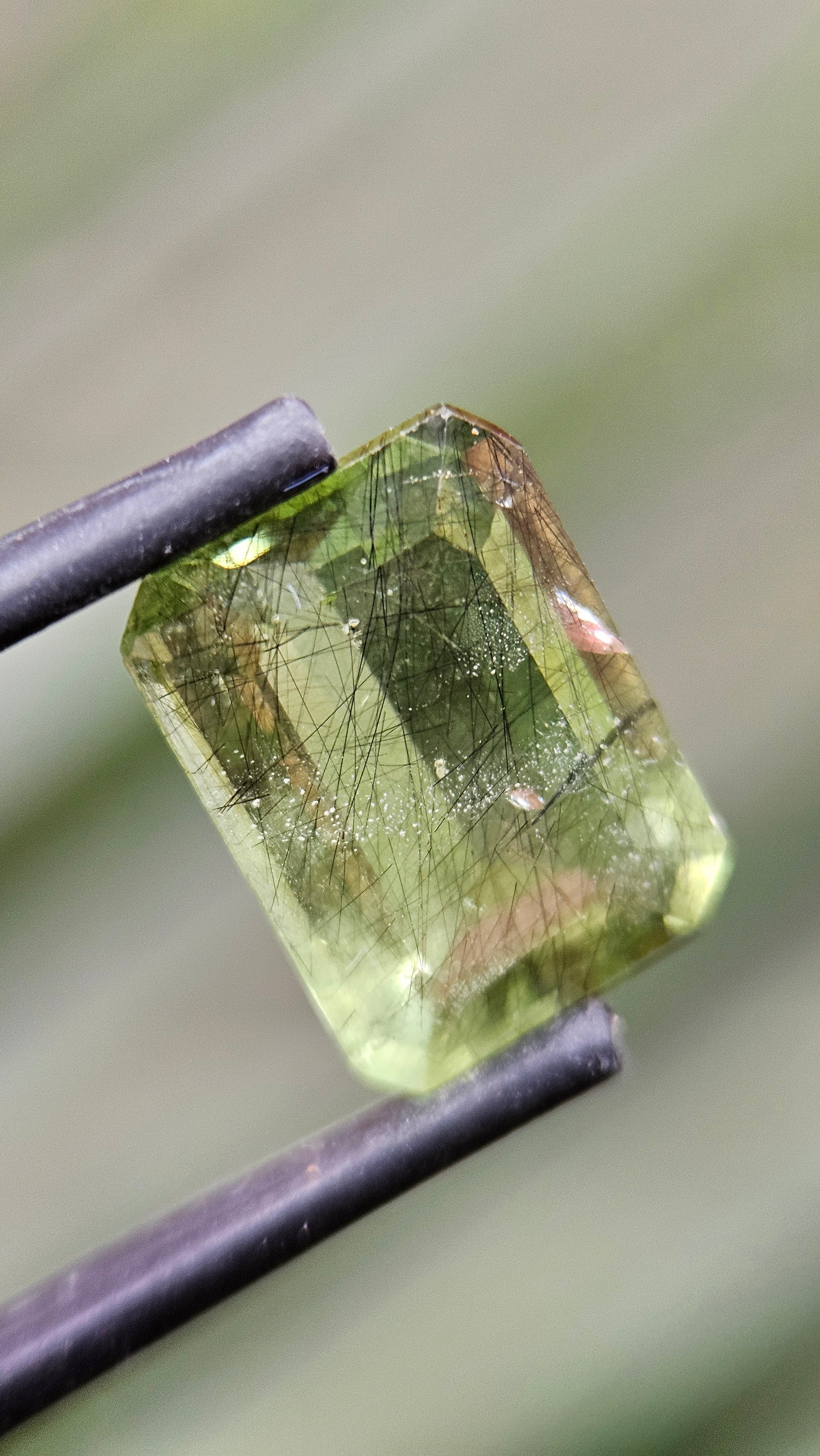 Rare 4.71ct Actinolite needles present in Peridot!