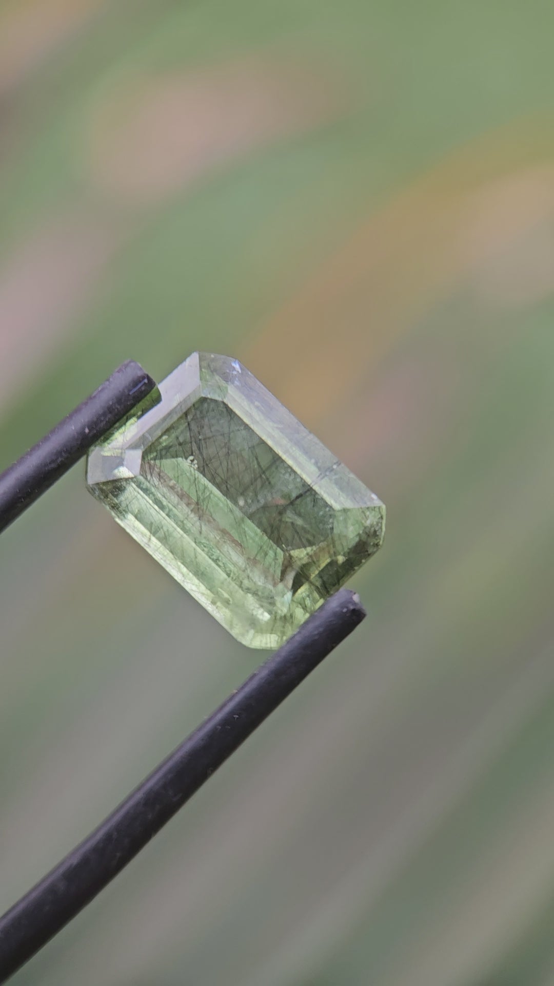 Rare 4.71ct Actinolite needles present in Peridot!
